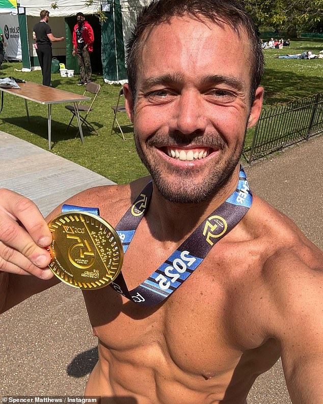 Spencer posed with his medal afterwards