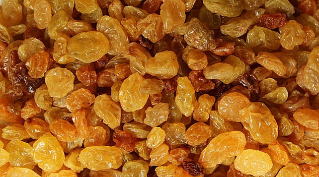 Scientists found adding any kind of dried fruit to the morning meal slashed the risk of dying from heart disease by 18 per cent and cancer by 11 per cent. Pictured: Stock image