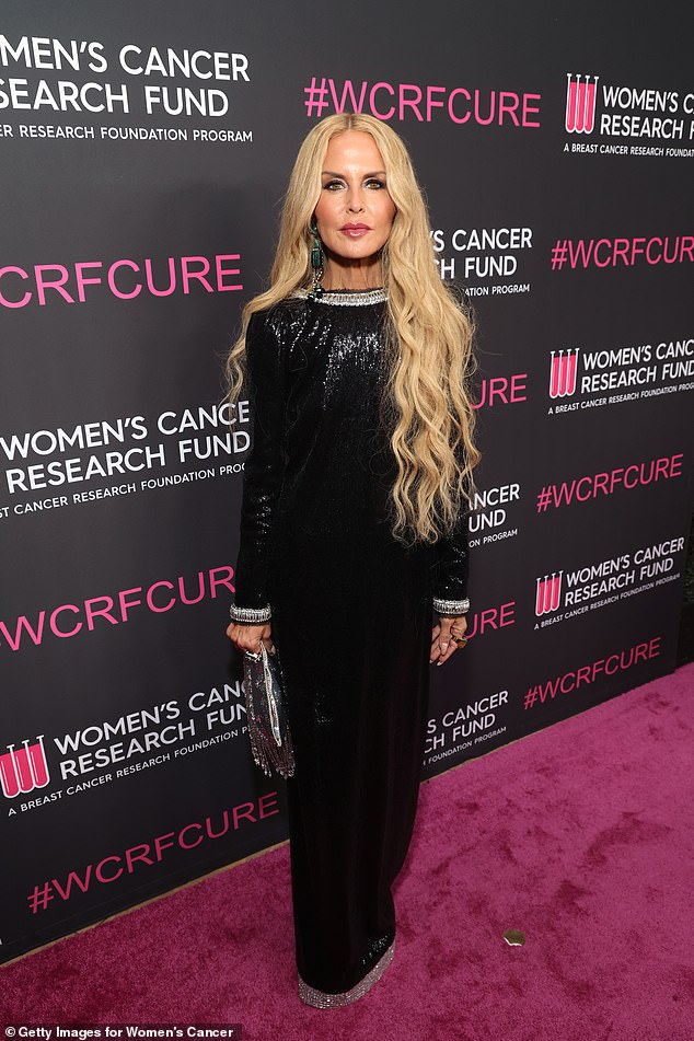 The fashion designer Rachel Zoe looked elegant in a floor-length black sequined dress with silvery trim