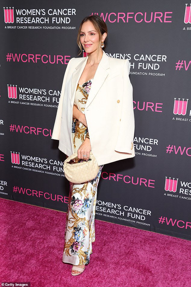 Katharine McPhee also favored flowers, but she wore a brighter white dress with colorful designs, along with a double-breasted, cream-colored blazer