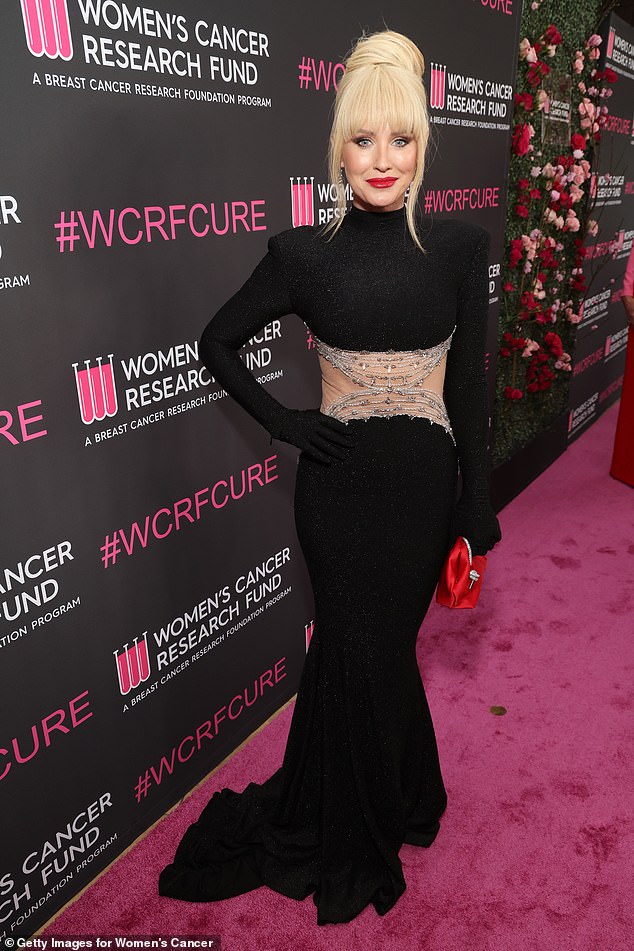 Neighbours star Nicky Whelan was unrecognisable on Sunday evening at a star-studded charity benefit in Los Angeles. Pictured