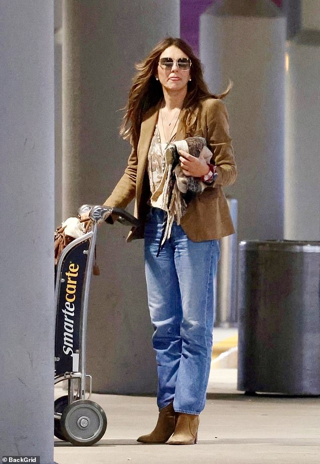 Billy Ray Cyrus and Elizabeth Hurley looked emotional as they prepared to part ways at Nashville International Airport on Monday night amid their whirlwind romance