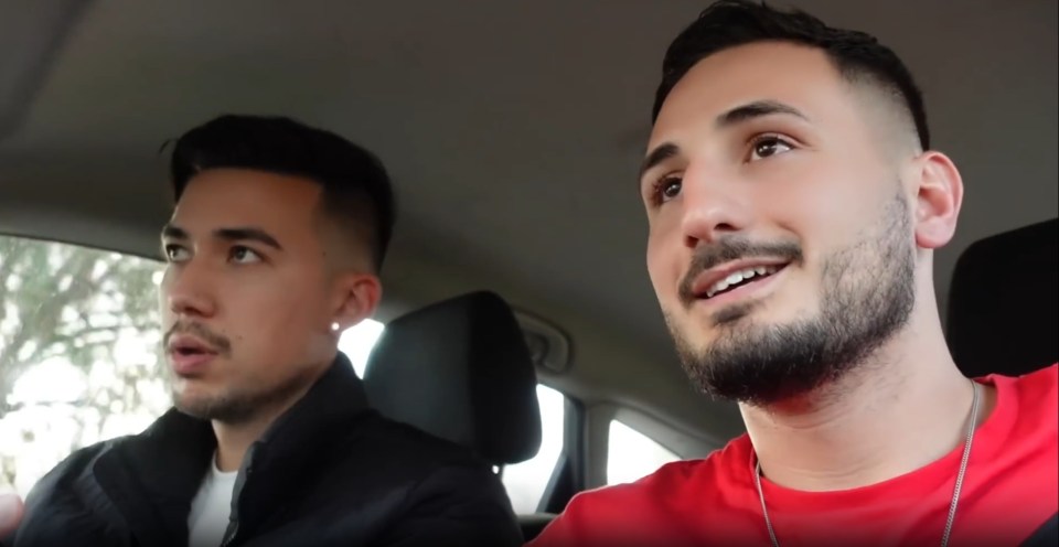 Two men in a car.