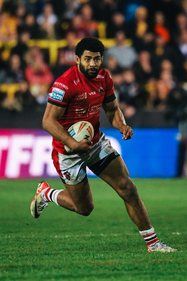 Kallum Watkins of Salford running with the rugby ball.