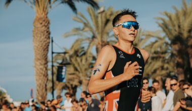 Alex Yee run palm trees Torremolinos WTCS Grand Final 2024 photo credit World Triathlon