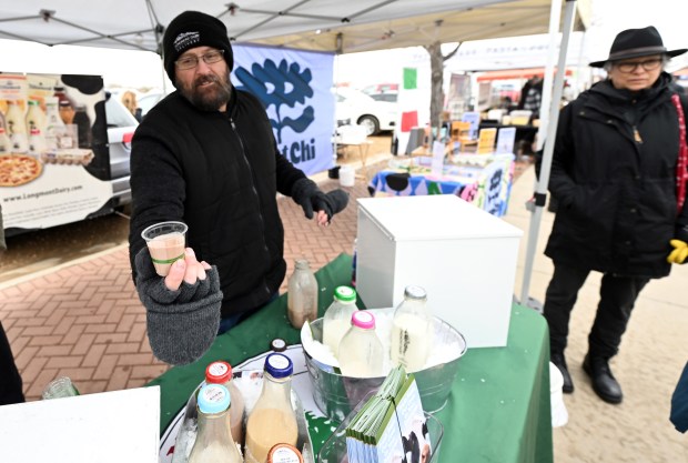 Frankie Wilcox, of the Longmont Dairy, has chocolate milk for...