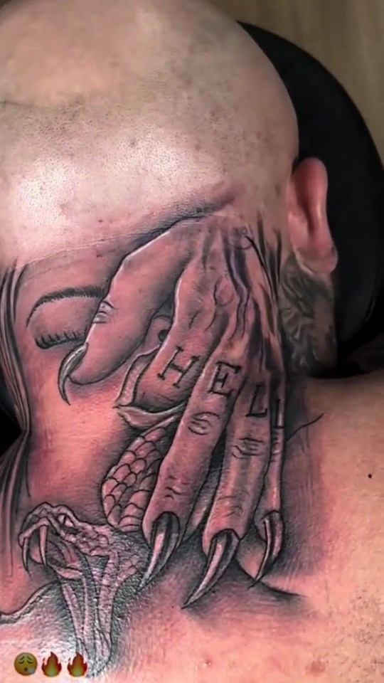 Neck tattoo of a clawed hand covering a face, with "HELL" spelled out on the hand's fingers and a snake at the bottom.
