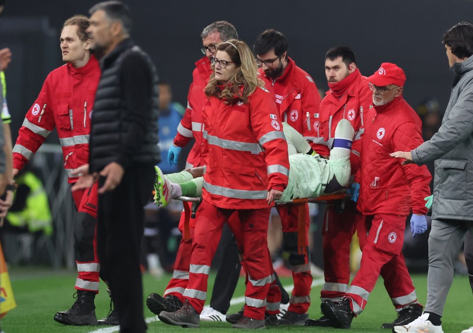 Goalkeeper Maignan taken off the field via a stretcher following the collision