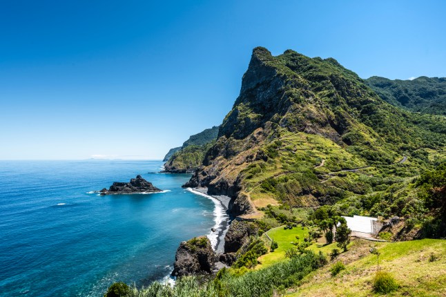 A stunning view over cliffs and the sea on the rugged coastline of Madeira, Portugal.