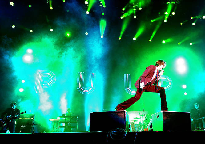 Pulp frontman Jarvis Cocker performing during the band's show at Coachella in 2012