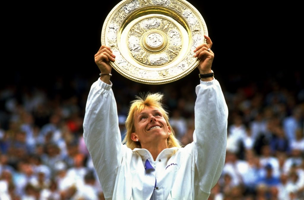 Jul 1990:  Martina Navratilova of the USA holds up the winners'' plate after winning the Wimbledon Championships played at Wimbledon, London, England.   Mandatory Credit: Allsport UK /Allsport