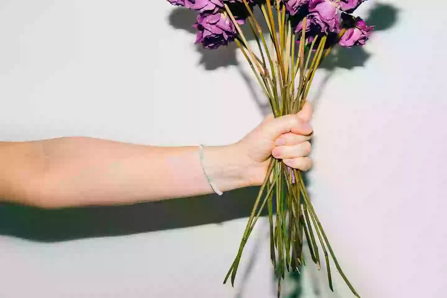 Some blokes are holding on a little too tightly. (Getty Stock Images)