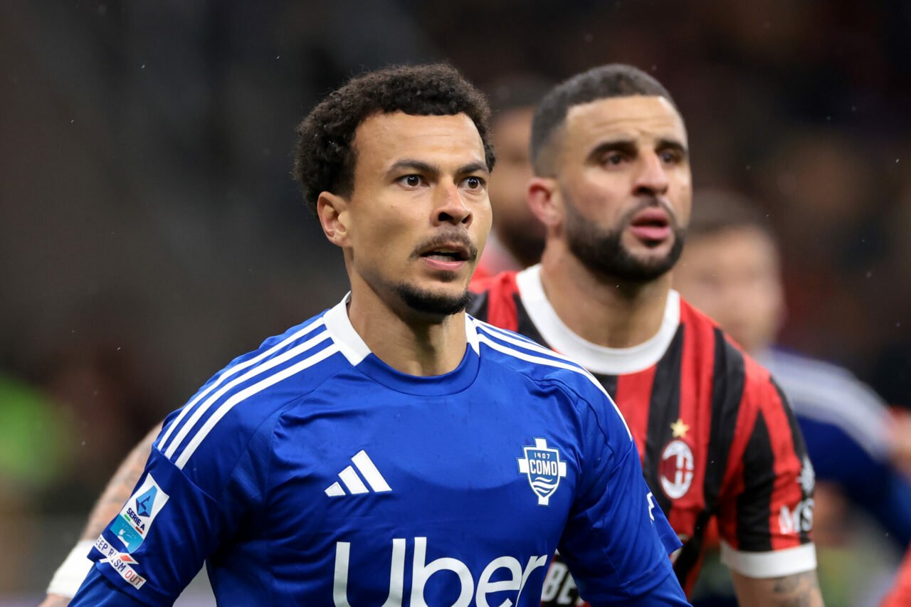 Dele Alli of Como 1907 is marked by fellow Englishman Kyle Walker of AC Milan during the Serie A match between AC Milan and Como 1907 at Stadio Giu...