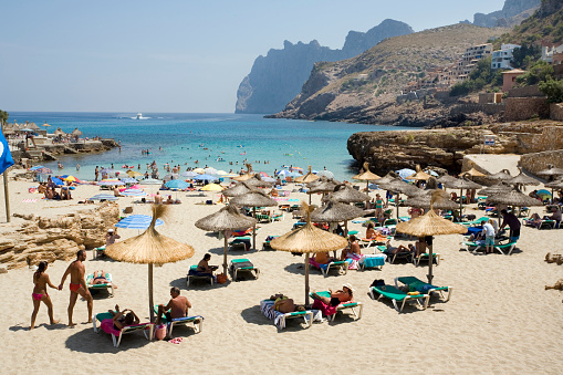 Tourists on Cala St. Vincenc