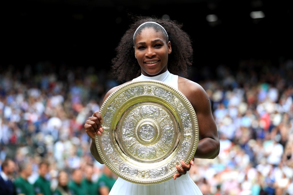 LONDON, ENGLAND - JULY 09:  Serena Williams of The United States lifts the trophy following victory in The Ladies Singles Final against Angelique Kerber of Germany on day twelve of the Wimbledon Lawn Tennis Championships at the All England Lawn Tennis and Croquet Club on July 9, 2016 in London, England.  (Photo by Adam Davy/Press Association/Pool/Getty Images)