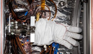 An astronaut glove being prepped for testing in the CITADEL chamber.