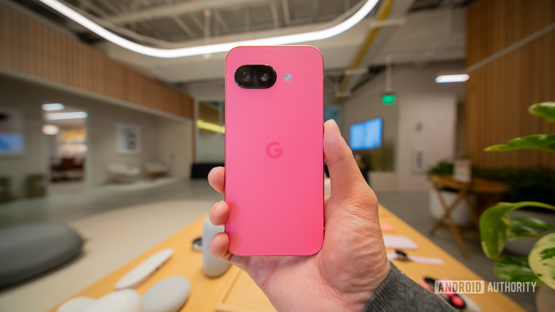 Google Pixel 9a pink rear in hand