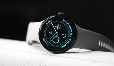 A Google Pixel Watch 3 displays a watch face.