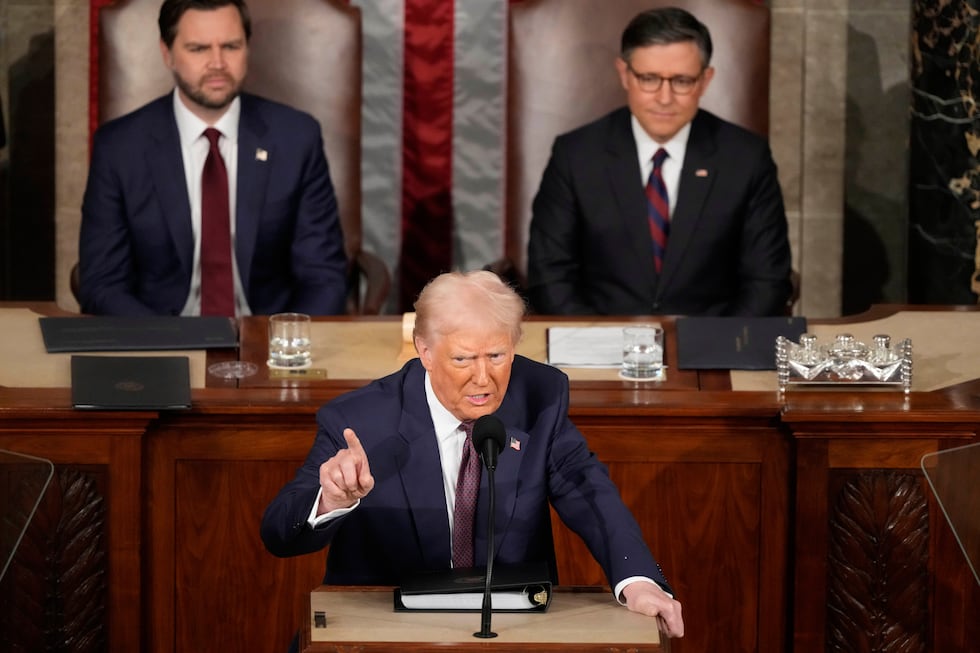 President Donald Trump speaks as Vice President JD Vance, left, and House Speaker Mike Johnson...