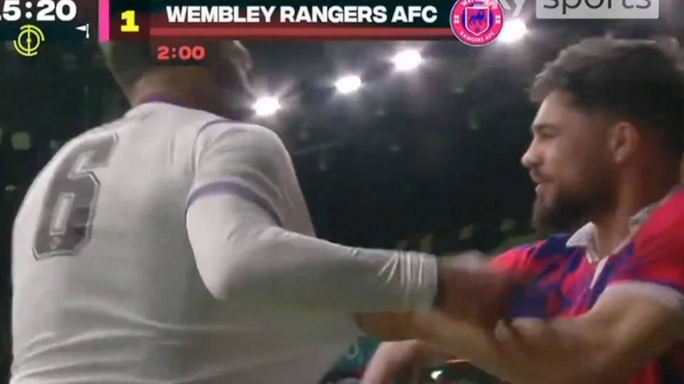 Two soccer players arguing.