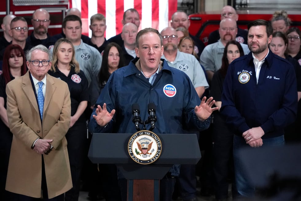 FILE - Vice President JD Vance, right, and Ohio Gov. Mike DeWine, left, listen as...