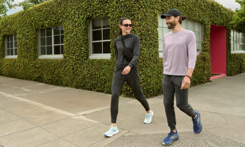 Two people walking on the street in Luxe