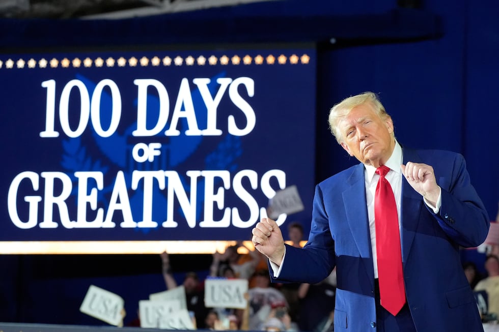 President Donald Trump arrives to speak on his first 100 days at Macomb County Community...