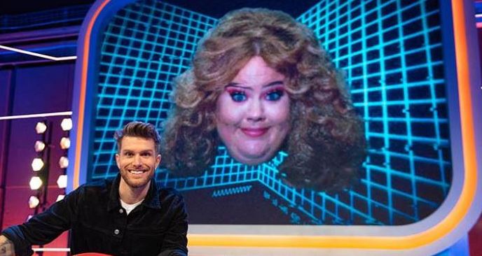 A man and a woman's face on a game show screen.