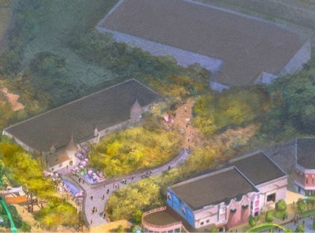 Concept art of a themed land with a turreted castle-like building at the Universal Studios Great Britain theme park opening in 2031 outside London. (Courtesy of Universal Studios)