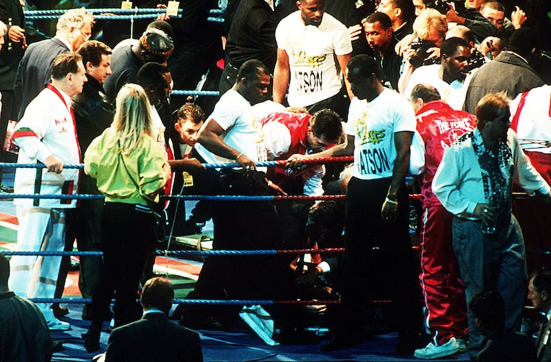 Michael Watson is treated after his WBO Middleweight title fight against Chris Eubank at White Hart Lane in September 1991. Photograph:  Bob Martin/Allsport