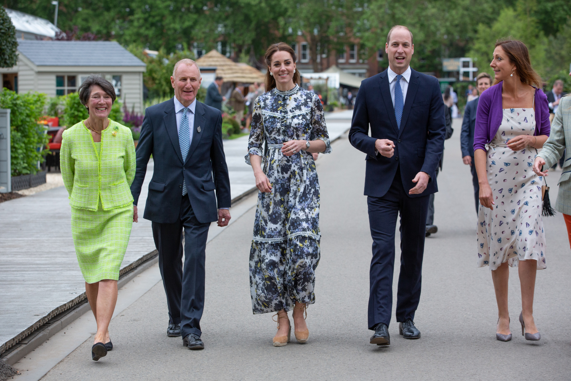 William and Catherine the Duke and Duchess of Cambridge walk with RHS Treasurer Sandy Muirhead and his wife left, and Haley Monckton