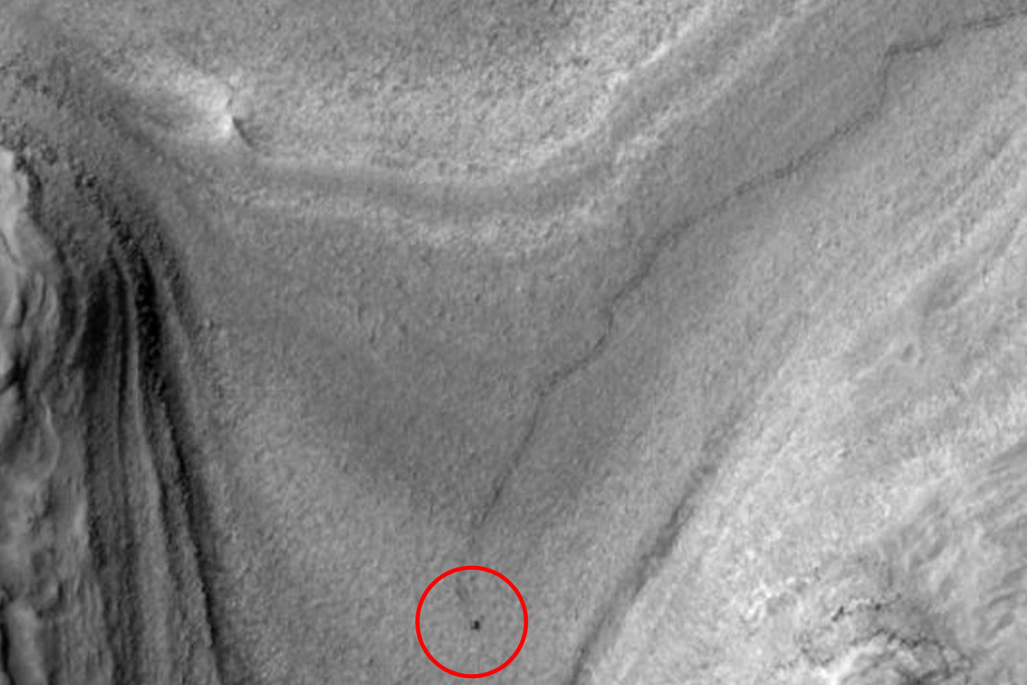 First-of-its-kind Nasa image shows mysterious dark object CRAWLING for 1,000 feet across Mars – can you tell what it is?