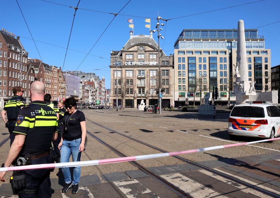 Mandatory Credit: Photo by Hollandse Hoogte/REX/Shutterstock (15236456h) AMSTERDAM - A car burned out on Dam Square near the National Monument. The driver was injured. Car Burned Out Near Monument on Dam Square, Suspected Intentional. - 03 Apr 2025
