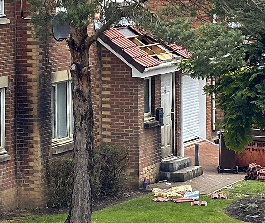 Pictured: Fire damage to a property in John Marshall Drive in Bishopbriggs, with a police cordon in place...Poperties associated with the Daniels family were targeted in firebomb attacks in Bishopbriggs as the feud intensified....(c) Dave Johnston