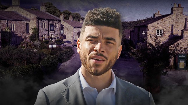 Nate Robinson in front of a gloomy Emmerdale village backdrop