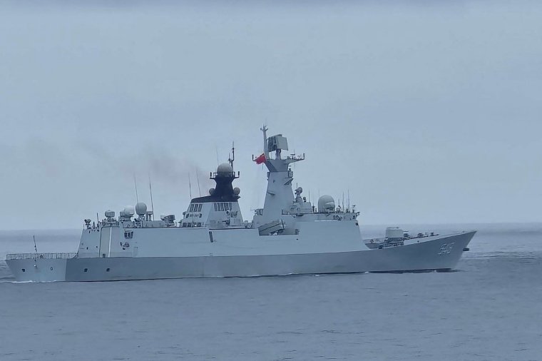 This handout photo taken and released by the Taiwan Coast Guard on May 23, 2024 shows a Chinese military ship northwest of Pengjia Island, off the coast of northern Taiwan. China on May 23 encircled Taiwan with naval vessels and military aircraft in war games aimed at punishing the self-ruled island after its new president vowed to defend democracy. (Photo by Handout / TAIWAN COAST GUARD / AFP) / -----EDITORS NOTE --- RESTRICTED TO EDITORIAL USE - MANDATORY CREDIT 
