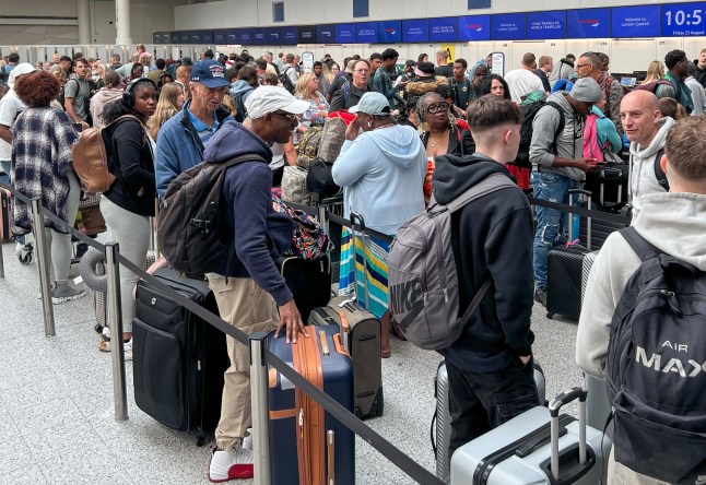 Passengers at Gatwick Airport security scanners on the August bank holiday weekend.
