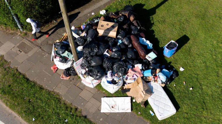 An aerial view of furniture and uncollected refuse bags in Yardley, east Birmingham, amid an ongoing refuse workers' strike in the city. Birmingham City Council says it is declaring a major incident over the impact of the ongoing bin strike, as it estimates 17,000 tonnes of waste remains uncollected around the city. Picture date: Tuesday April 1, 2025. PA Photo. Members of the Unite union in Birmingham are holding an all-out strike in a long-running dispute, after the scrapping of waste collection and recycling officer roles, which has led to rubbish piling up in the streets and residents complaining about rats. See PA story INDUSTRY Strikes. Photo credit should read: Jacob King/PA Wire
