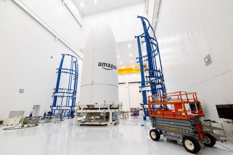 This handout image released by Amazon on April 2, 2025 shows Project Kuiper's satellites encapsulated in an Atlas V rocket fairing at Amazon's satellite processing facility in Cape Canaveral, Florida, in March 2025. Amazon is preparing to launch its first full batch of Project Kuiper satellites next week, marking a crucial milestone in the tech giant's bid to compete with Elon Musk's Starlink. The mission, named Kuiper Atlas 1, will launch 27 satellites using an Atlas V rocket from Cape Canaveral, Florida at 12:00 pm EDT (1600 GMT) on April 9, Amazon said. (Photo by Amazon / AFP) / RESTRICTED TO EDITORIAL USE - MANDATORY CREDIT "AFP PHOTO / AMAZON " - NO MARKETING NO ADVERTISING CAMPAIGNS - DISTRIBUTED AS A SERVICE TO CLIENTS (Photo by -/Amazon/AFP via Getty Images)