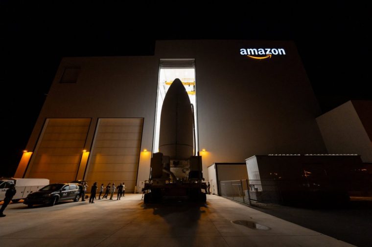 This handout image released by Amazon on April 2, 2025 shows encapsulated Project Kuiper satellites being transported for integration with an Atlas V rocket at Amazon's satellite processing facility in Cape Canaveral, Florida, in March 2025. Amazon is preparing to launch its first full batch of Project Kuiper satellites next week, marking a crucial milestone in the tech giant's bid to compete with Elon Musk's Starlink. The mission, named Kuiper Atlas 1, will launch 27 satellites using an Atlas V rocket from Cape Canaveral, Florida at 12:00 pm EDT (1600 GMT) on April 9, Amazon said. (Photo by Amazon / AFP) / RESTRICTED TO EDITORIAL USE - MANDATORY CREDIT "AFP PHOTO / AMAZON " - NO MARKETING NO ADVERTISING CAMPAIGNS - DISTRIBUTED AS A SERVICE TO CLIENTS (Photo by -/Amazon/AFP via Getty Images)