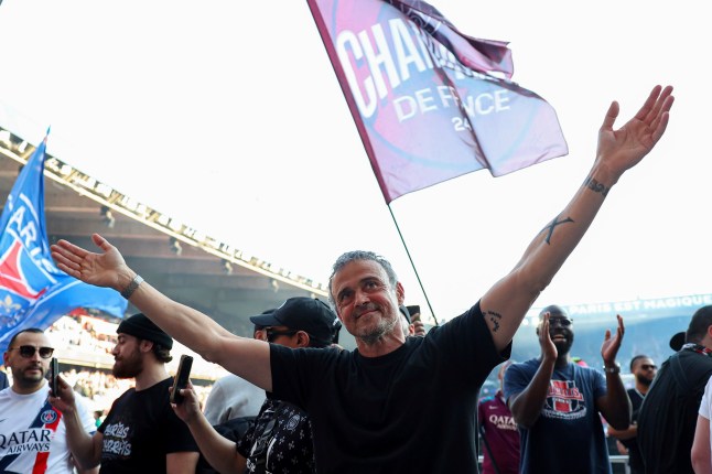 Paris Saint-Germain's Spanish headcoach Luis Enrique reacts after the team won the match and the French championship title following the French League One soccer match between Paris Saint-Germain and Angers at the Parc des Princes Stadium in Paris Friday April 5, 2025. (Franck Fife, Pool via AP)