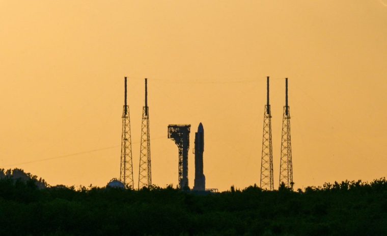 A United Launch Alliance Atlas V rocket stands on the pad with a payload of Amazon's Project Kuiper internet network satellites, which are expected to eventually rival Elon Musk's Starlink system, at the Cape Canaveral Space Force Station in Cape Canaveral, Florida, U.S., April 9, 2025. REUTERS/Steve Nesius