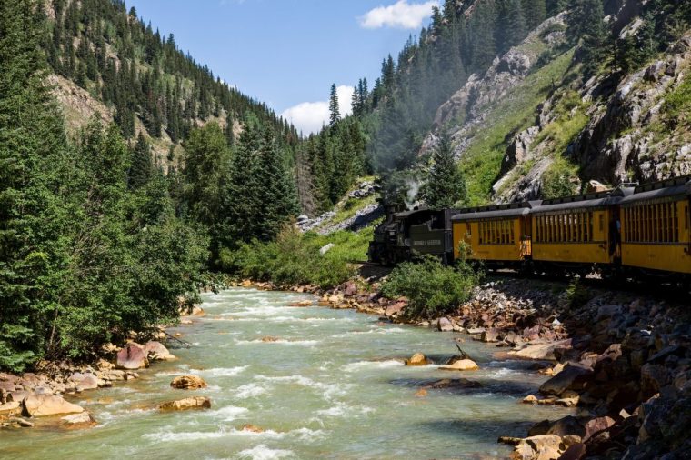 The Durango and Silverton Narrow Gauge Railroad travels along the Animas River as it passes through the San Juan Mountains between Durango and Silverton, Colorado.. (Photo by: Jon G. Fuller/VWPics/Universal Images Group via Getty Images)