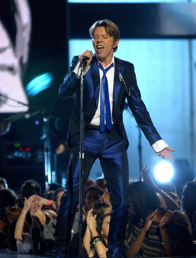 David Bowie sings onstage