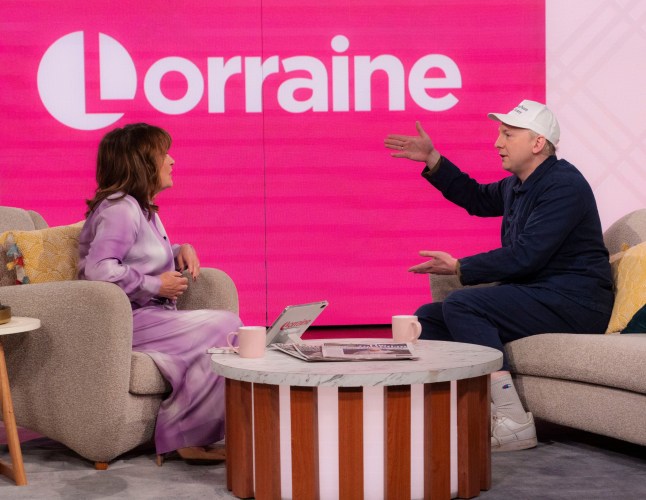 Joe Lycett sat with Lorrain Kelly on the set of her popular ITV show