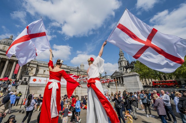Mandatory Credit: Photo by Guy Bell/REX/Shutterstock (12908312ab) The divine stilt walkers with their George Cross flags - St George's Day celebrations return to Trafalgar Square, a family event with live music, entertainment and food, supported by the Mayor of London. St George's Day celebrations return to Trafalgar Square, London., Trafalgar Square, London, UK - 23 Apr 2022