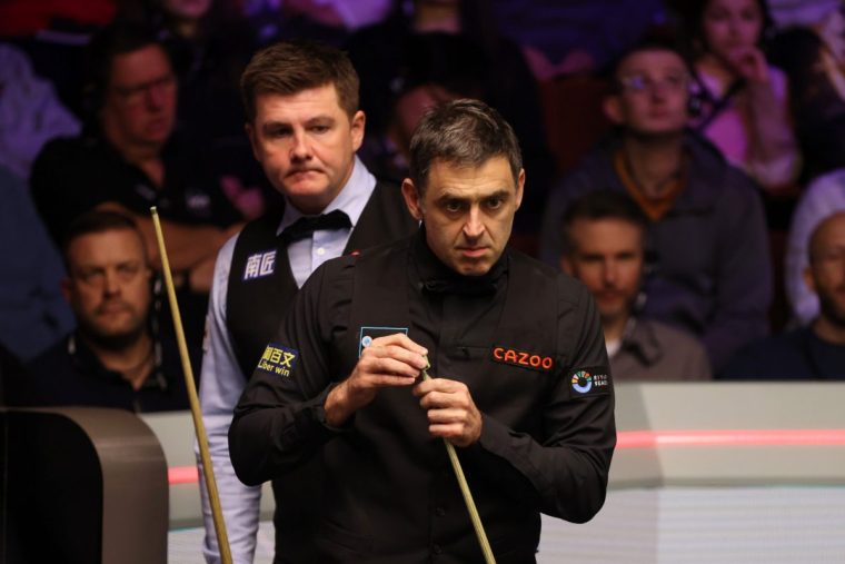 SHEFFIELD, ENGLAND - APRIL 28: Ronnie O'Sullivan of England chalks the cue against Ryan Day of Wales in their round two match during day nine of the Cazoo World Snooker Championship 2024 at Crucible Theatre on April 28, 2024 in Sheffield, England. (Photo by George Wood/Getty Images)