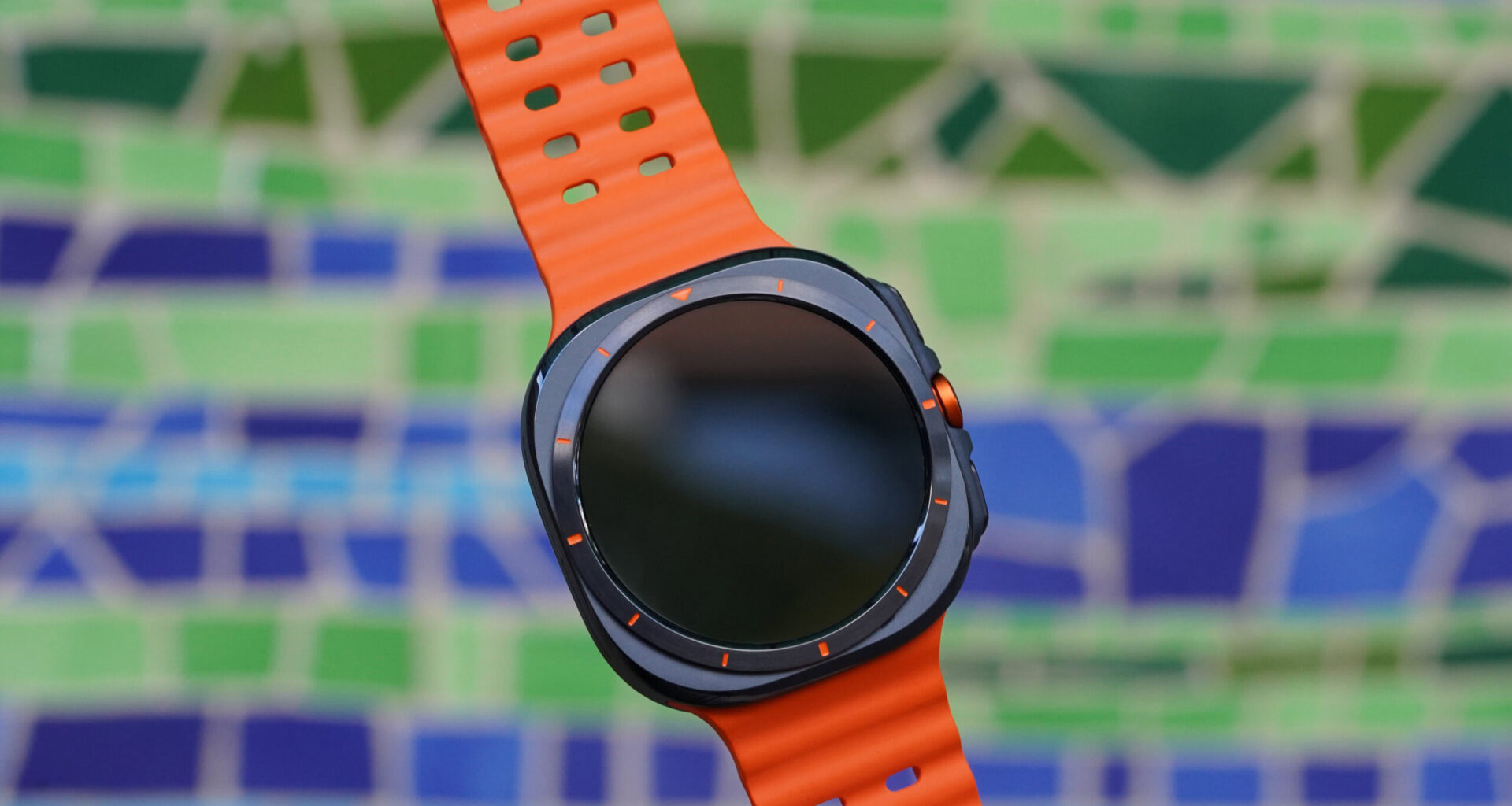 The Samsung Galaxy Watch Ultra features a squircle watch case and orange detailing.