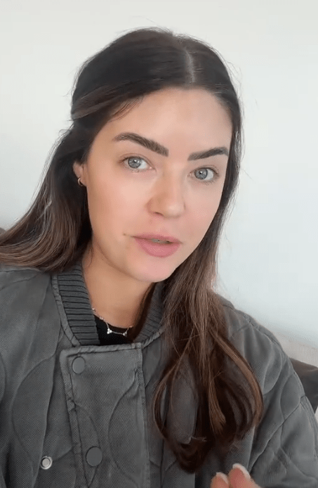 Screenshot of a woman speaking.