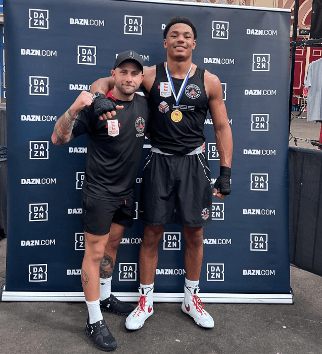 Two boxers posing together.